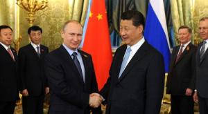 Путин: Россия, объединяя усилия с Китаем, сумеет преодолеть все проблемы