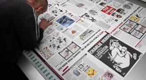 Charlie Hebdo опубликовал карикатуру на российских болельщиков