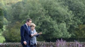 Меркель заявила о готовности рассмотреть все предложения Кэмерона по членству в ЕС