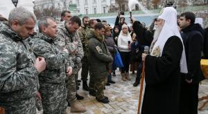 Захарченко призвал главу украинских раскольников снять рясу и ехать на фронт